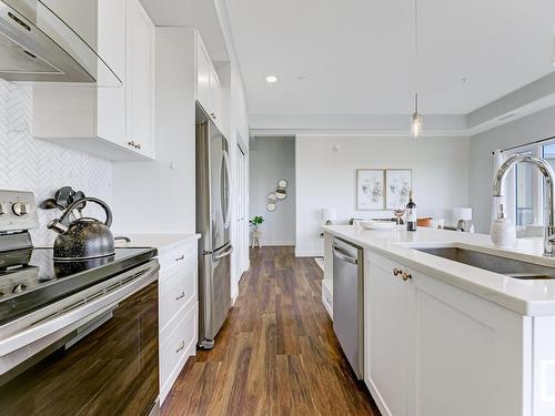 511 1316 Windermere Way, Edmonton, AB - Indoor Photo Showing Kitchen With Stainless Steel Kitchen With Upgraded Kitchen