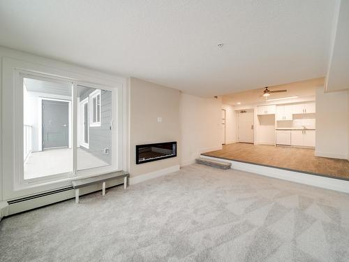 202 9504 182 Street, Edmonton, AB - Indoor With Fireplace