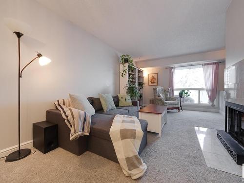 78 2703 79 Street, Edmonton, AB - Indoor Photo Showing Living Room With Fireplace