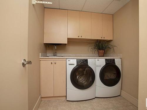 1201 10035 Saskatchewan Drive, Edmonton, AB - Indoor Photo Showing Laundry Room