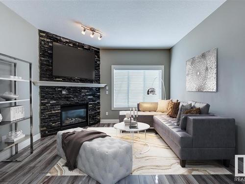 11243 102 Street, Edmonton, AB - Indoor Photo Showing Living Room With Fireplace