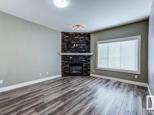 11243 102 Street, Edmonton, AB - Indoor Photo Showing Living Room With Fireplace