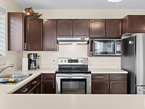 833 116A Street, Edmonton, AB - Indoor Photo Showing Kitchen With Stainless Steel Kitchen With Double Sink