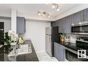 309 5804 Mullen Place Nw, Edmonton, AB  - Indoor Photo Showing Kitchen With Double Sink 