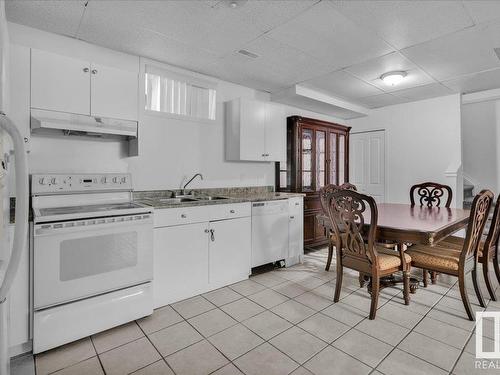 3508 24 Street, Edmonton, AB - Indoor Photo Showing Kitchen With Double Sink