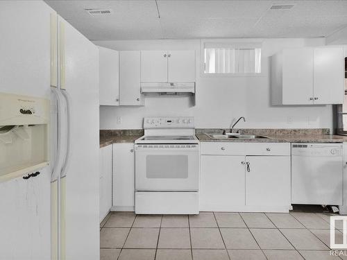 3508 24 Street, Edmonton, AB - Indoor Photo Showing Kitchen With Double Sink