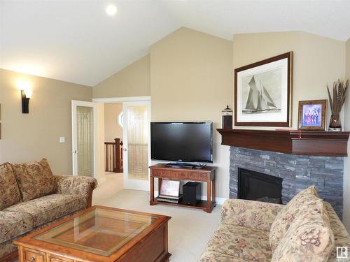 1111 Hainstock Green, Edmonton, AB - Indoor Photo Showing Living Room With Fireplace