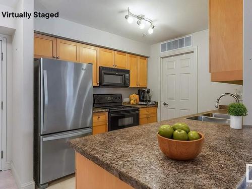 301 13005 140 Avenue, Edmonton, AB - Indoor Photo Showing Kitchen With Double Sink