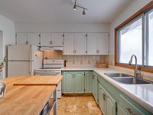 6919 83 Avenue Nw, Edmonton, AB - Indoor Photo Showing Kitchen With Double Sink