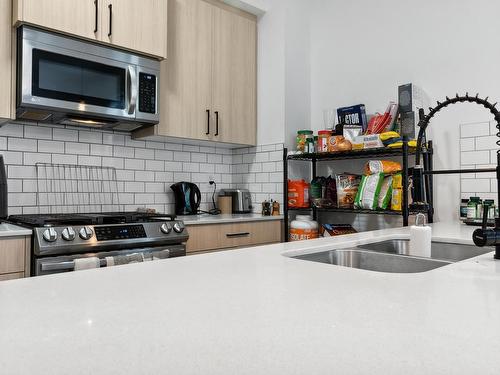 9537 106A Avenue, Edmonton, AB - Indoor Photo Showing Kitchen With Double Sink