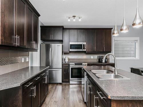 1515 Chapman Way, Edmonton, AB - Indoor Photo Showing Kitchen With Stainless Steel Kitchen With Double Sink With Upgraded Kitchen