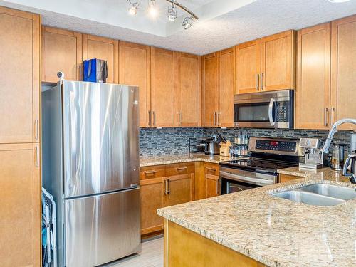 1023 5151 Windermere Boulevard, Edmonton, AB - Indoor Photo Showing Kitchen With Stainless Steel Kitchen With Double Sink