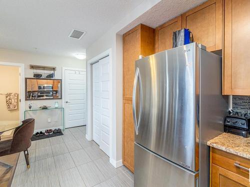 1023 5151 Windermere Boulevard, Edmonton, AB - Indoor Photo Showing Kitchen With Stainless Steel Kitchen