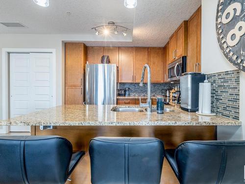 1023 5151 Windermere Boulevard, Edmonton, AB - Indoor Photo Showing Kitchen With Stainless Steel Kitchen With Double Sink With Upgraded Kitchen