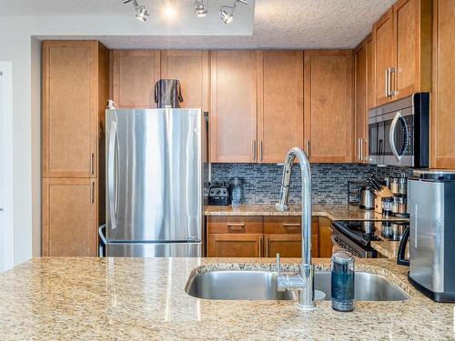 1023 5151 Windermere Boulevard, Edmonton, AB - Indoor Photo Showing Kitchen With Stainless Steel Kitchen With Double Sink With Upgraded Kitchen