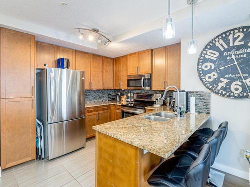 1023 5151 Windermere Boulevard, Edmonton, AB - Indoor Photo Showing Kitchen With Stainless Steel Kitchen With Double Sink