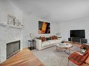 203 10421 93 Street, Edmonton, AB  - Indoor Photo Showing Living Room With Fireplace 