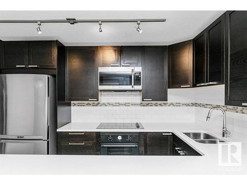 35 10015 83 Avenue, Edmonton, AB - Indoor Photo Showing Kitchen With Double Sink With Upgraded Kitchen