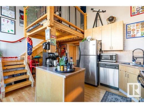 110 10265 107 Street, Edmonton, AB - Indoor Photo Showing Kitchen With Stainless Steel Kitchen