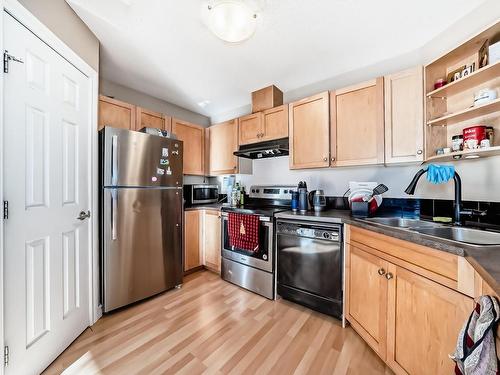 48 150 Edwards Drive, Edmonton, AB - Indoor Photo Showing Kitchen With Double Sink