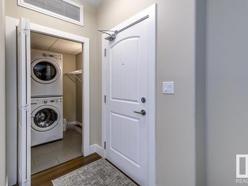 233 6079 Maynard Way, Edmonton, AB - Indoor Photo Showing Laundry Room