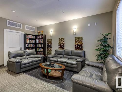 233 6079 Maynard Way, Edmonton, AB - Indoor Photo Showing Living Room