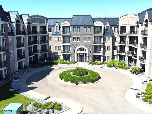 233 6079 Maynard Way, Edmonton, AB - Outdoor With Balcony With Facade