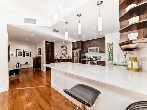 206 11660 79 Avenue, Edmonton, AB - Indoor Photo Showing Kitchen With Upgraded Kitchen