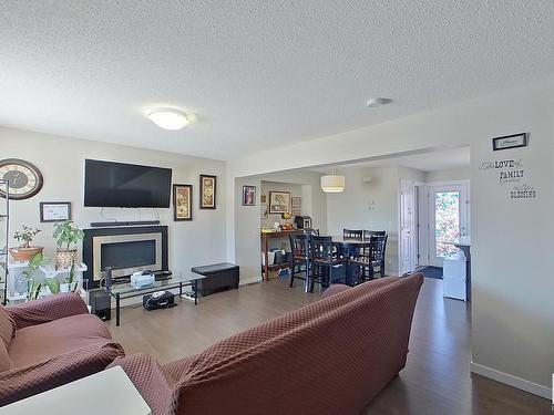 18104 78 Street Nw, Edmonton, AB - Indoor Photo Showing Living Room With Fireplace