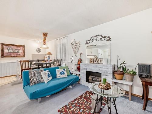 7348 188 Street Nw, Edmonton, AB - Indoor Photo Showing Living Room With Fireplace