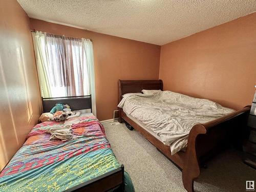 1703 Lakewood Road S, Edmonton, AB - Indoor Photo Showing Bedroom