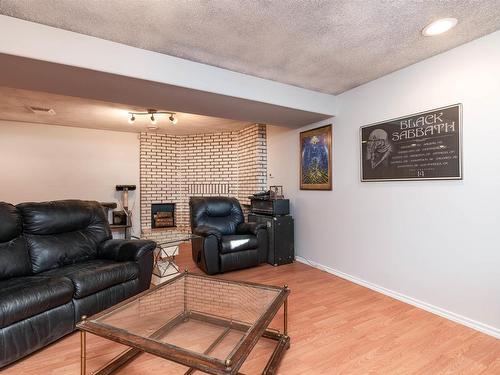 2605 135A Avenue, Edmonton, AB - Indoor Photo Showing Living Room With Fireplace