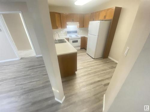 128 15499 Castle Downs Road, Edmonton, AB - Indoor Photo Showing Kitchen With Double Sink