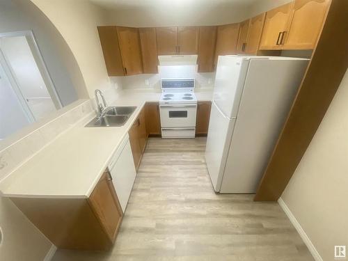 128 15499 Castle Downs Road, Edmonton, AB - Indoor Photo Showing Kitchen With Double Sink