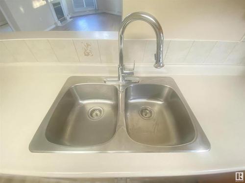 128 15499 Castle Downs Road, Edmonton, AB - Indoor Photo Showing Kitchen With Double Sink