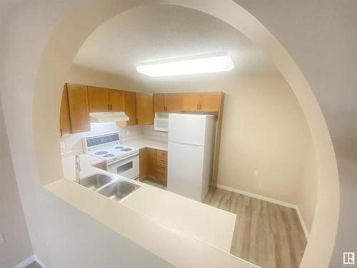 128 15499 Castle Downs Road, Edmonton, AB - Indoor Photo Showing Kitchen With Double Sink