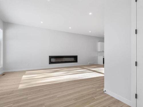 9846 74 Avenue, Edmonton, AB - Indoor Photo Showing Other Room With Fireplace