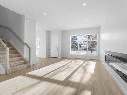 9846 74 Avenue, Edmonton, AB - Indoor Photo Showing Living Room With Fireplace