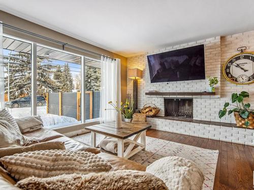 7731 152 Street, Edmonton, AB - Indoor Photo Showing Living Room With Fireplace