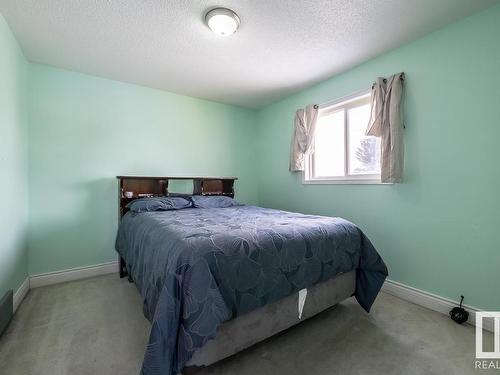 4571 32 Avenue, Edmonton, AB - Indoor Photo Showing Bedroom