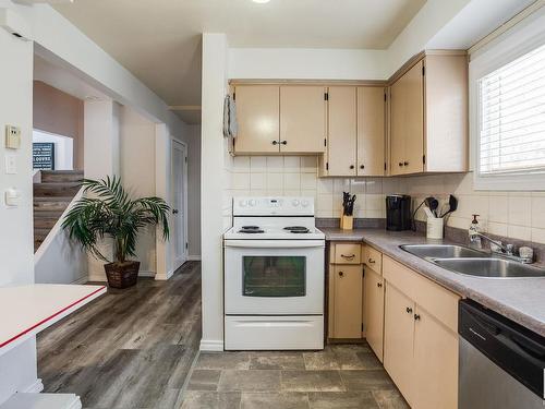 5113 106A Street, Edmonton, AB - Indoor Photo Showing Kitchen With Double Sink