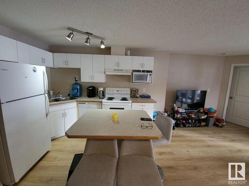 101 10535 122 Street, Edmonton, AB - Indoor Photo Showing Kitchen With Double Sink