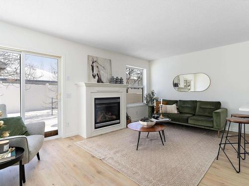 35 230 Edwards Drive, Edmonton, AB - Indoor Photo Showing Living Room With Fireplace