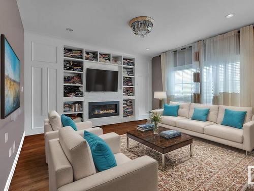 5264 17 Avenue, Edmonton, AB - Indoor Photo Showing Living Room With Fireplace