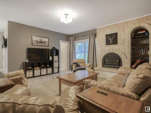 84 Valleyview Crescent, Edmonton, AB - Indoor Photo Showing Living Room With Fireplace