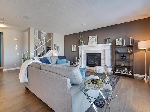 1640 Davidson Green, Edmonton, AB - Indoor Photo Showing Living Room With Fireplace