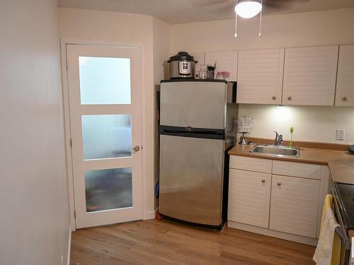 206 10149 Saskatchewan Drive, Edmonton, AB - Indoor Photo Showing Kitchen