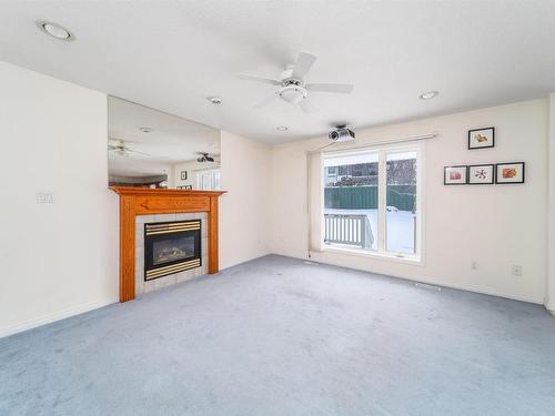 370 Heath Road, Edmonton, AB - Indoor Photo Showing Other Room With Fireplace