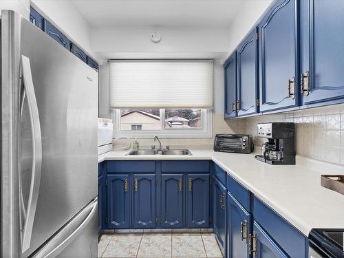 12114 77 Street, Edmonton, AB - Indoor Photo Showing Kitchen With Double Sink