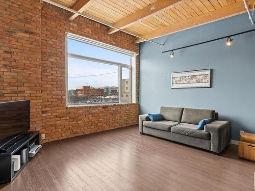 213 10309 107 Street, Edmonton, AB - Indoor Photo Showing Living Room